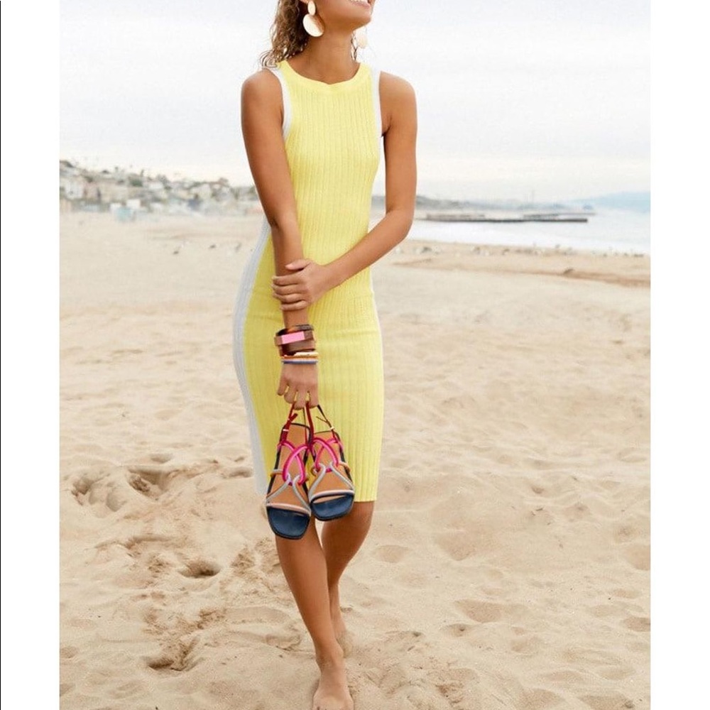 Neon yellow ribbed sweater dress. Midi length